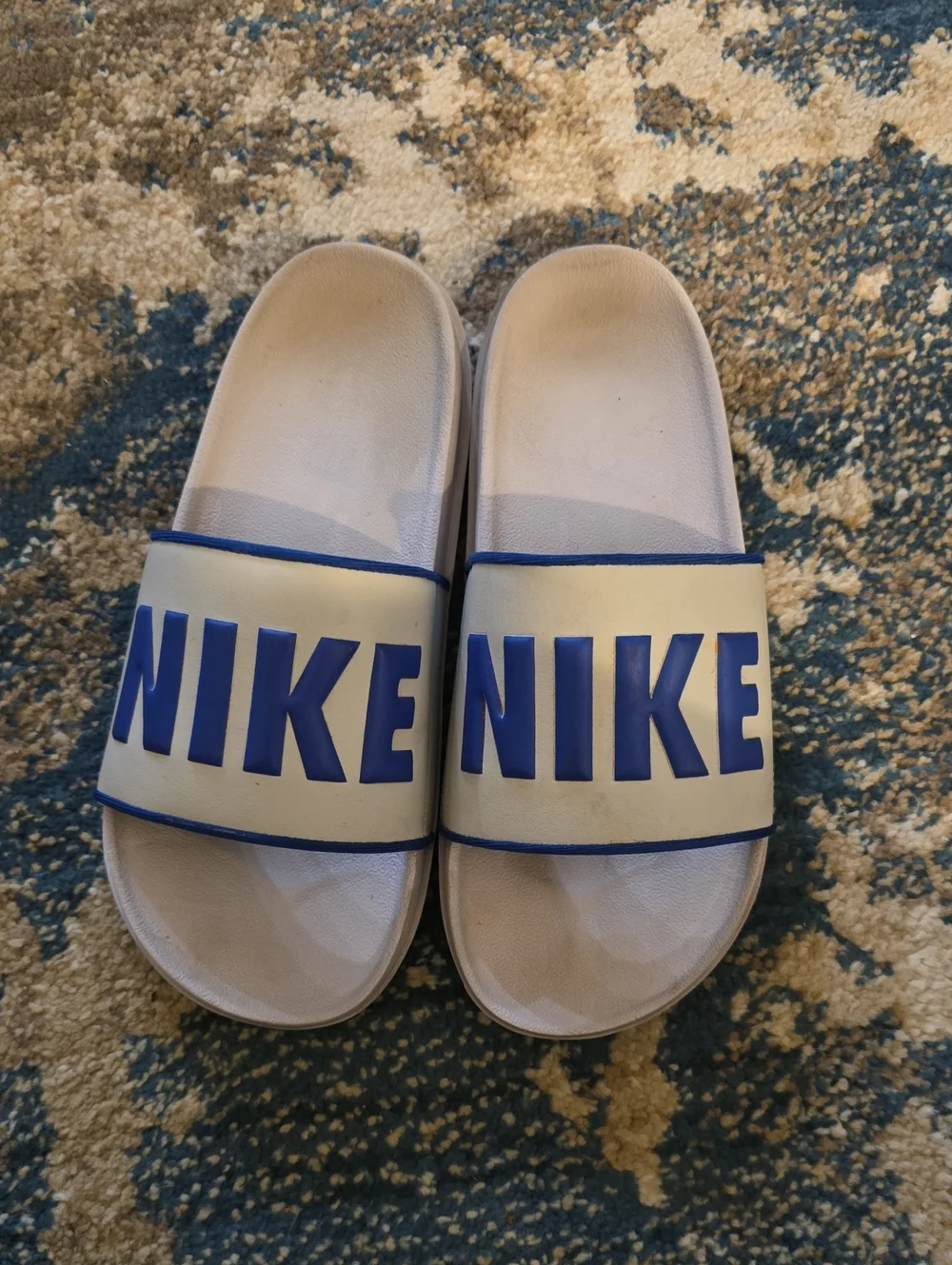 Nike Grey and Blue Slide Sandals with Bold Logo
